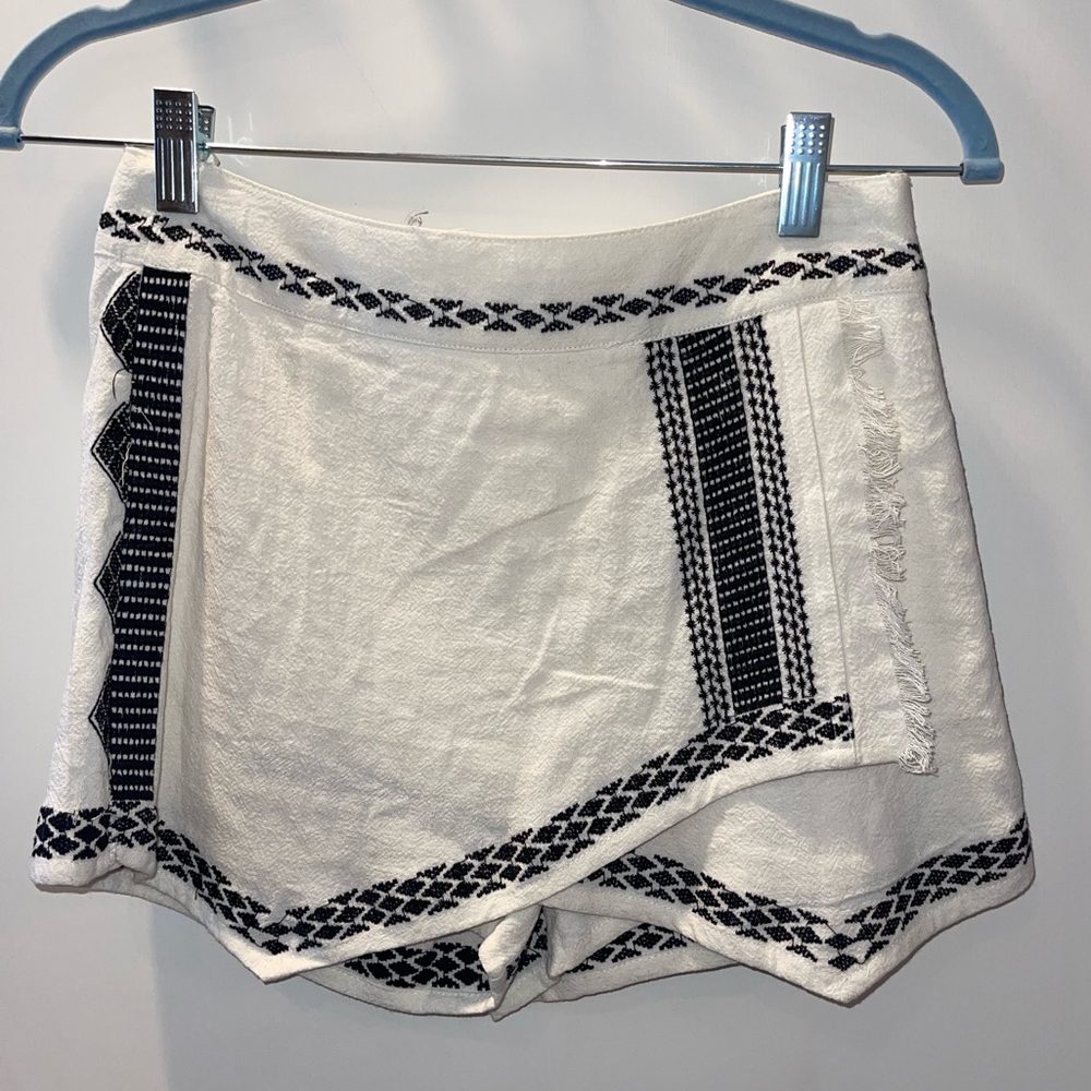 White skort with black stitching
